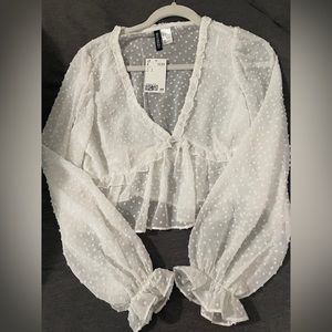 Sheer white blouse new with tags. Size small